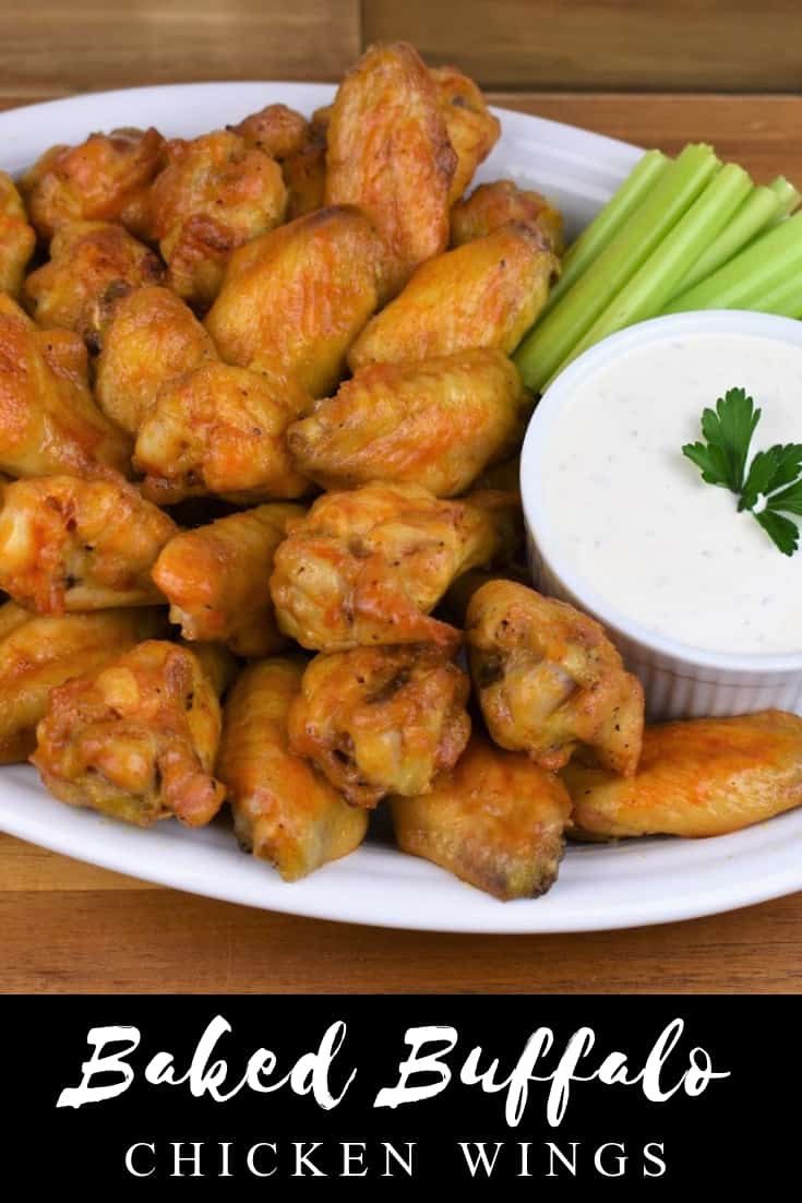 These tasty buffalo wings are crispy and fall off the bone, and yes, they’re baked not fried. The trick, use a baking sheet lined with a cooling rack so air can circulate around the wings. The skin dries up nicely and the inside stays tender and moist. #bakedbuffalowings #buffalowings #wings #gamedayappetizers #appetizers #partyfood