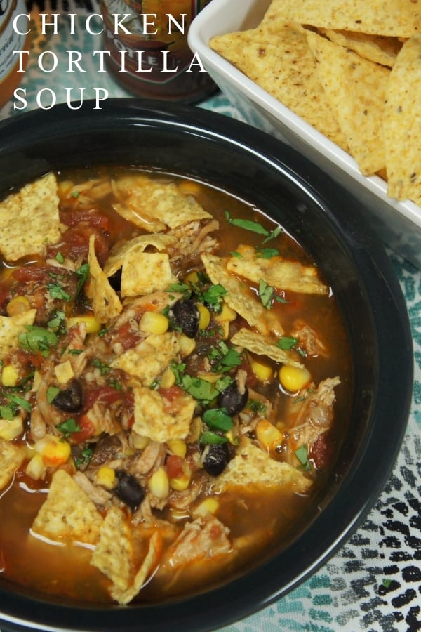 This chicken corn tortilla soup is budget friendly, easy to make and it’s delicious! Cut down the cooking time by using leftover chicken, store bought rotisserie, or poach some chicken breasts, either way, super easy. #chickencorntortillasoup #soup #chicken #easydinners #southwestern #mexican