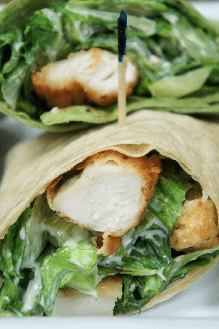 These crispy chicken Caesar salad wraps are a nice way to change up your dinner routine. They’re also perfect for lunch, and even make a nice addition to a game-day or cocktail party appetizer table. #chickencaesar #salads #wraps #crispychicken #lunch #partyfood