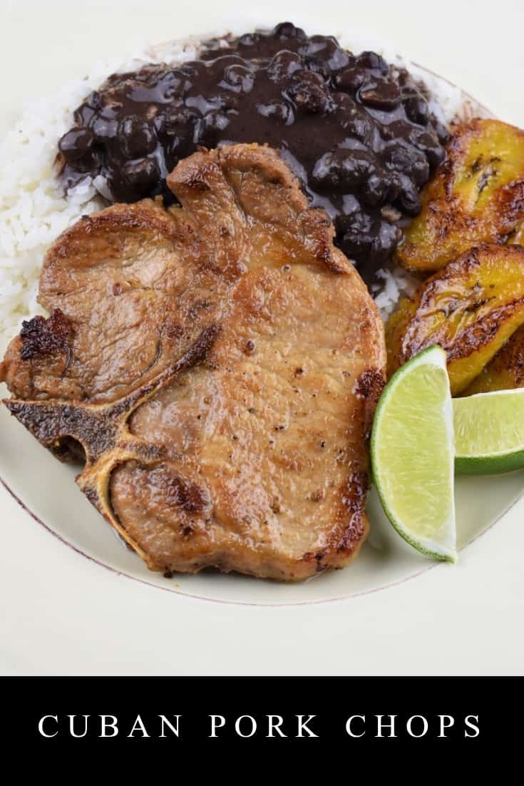 These Cuban pork chops or chuletas de cerdo in Spanish, make an easy, affordable and quick dinner. In this recipe, thin-cut pork chops are seasoned with garlic powder, cumin, oregano and salt and pepper. Then we squeeze some fresh lime juice over them and let them marinate for great flavor. Serve the pork chops with white rice and black beans or mashed potatoes for a filling and delicious meal. #cubanporkchops #porkchops #Cubanfood