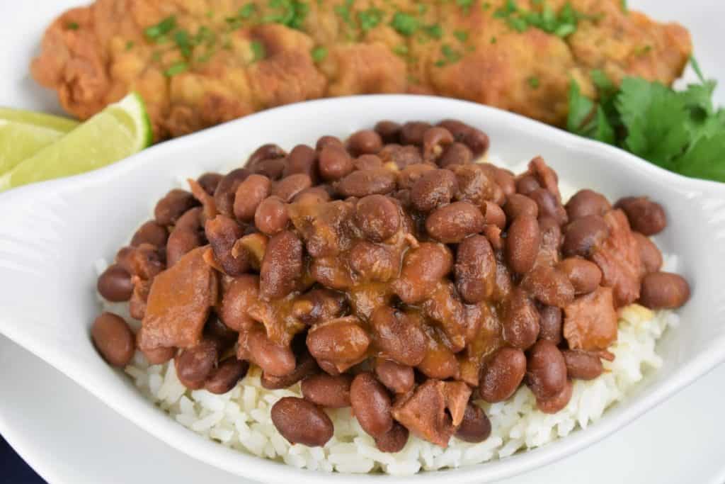 A close-up of Cuban Red Beans served over white rice