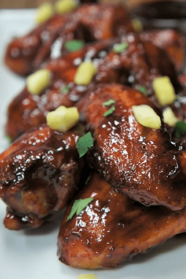 If you’re a fan of spicy food, these baked habanero chicken wings are for you. Plain barbeque sauce is combined with a generous amount of habanero hot sauce. Just how much is up to you. #chickenwings #habanerosauce #habanero #wings #appetizers #partyfood #gamedayappetizers