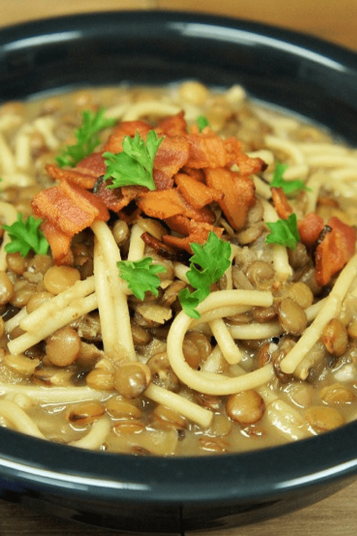 This Lentils with Spaghetti & Bacon recipe is really easy to make and absolutely delicious. We keep it simple with just a handful of ingredients: onions, garlic and oregano are sautéed in bacon drippings. Then we add the lentils, chicken broth and spaghetti, that’s it. #lentils #soup #lentilsoup #bacon