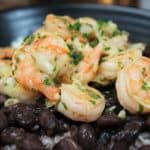Mojo Shrimp with lots of garlic and parsley, served on white rice and black beans
