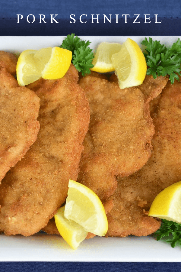 If you’re looking for something different for dinner, or you want to put together an Oktoberfest feast, try this pork schnitzel recipe. Schnitzel is a piece of meat that has been pounded thin. Then it’s dredged in flour, breaded, fried and served with fresh lemon. The pork is simply seasoned with salt; the lemon really wakes up the flavor of the dish. #porkschnitzel #pork #Germanfood #oktoberfest #octoberfest #breadedpork #schnitzel