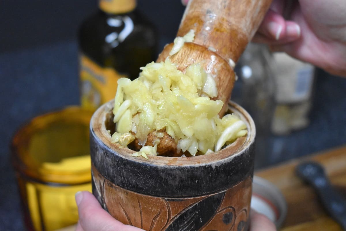 Smashed Garlic in a Mortar and Pestle