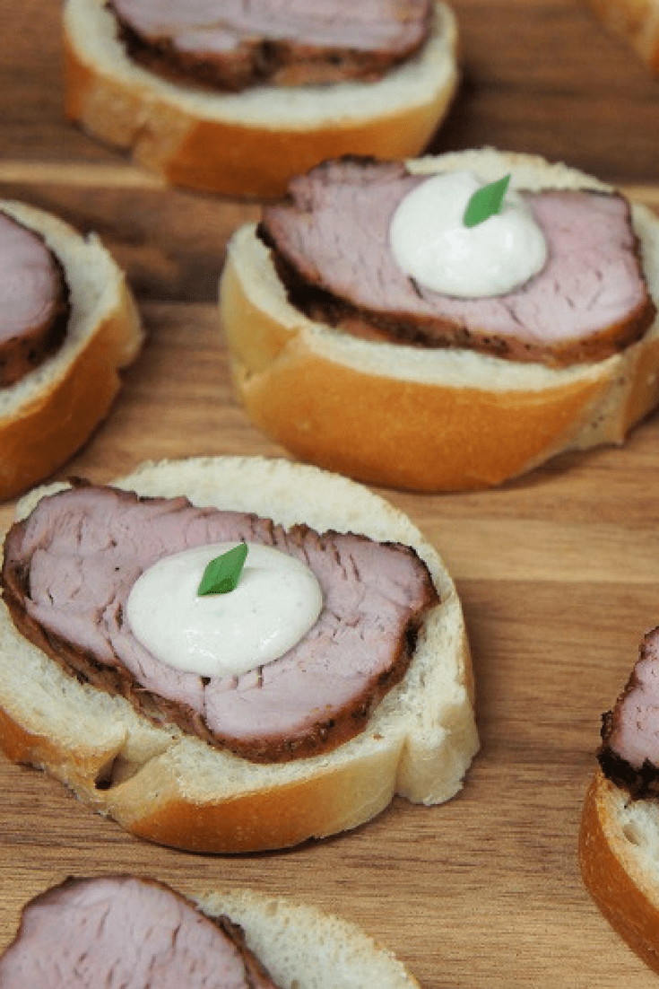 These pork tenderloin tidbits with a creamy horseradish sauce are a lovely appetizer to serve at your next cocktail or holiday party. #tidbits #porktenderloin #pork #appetizers #partyfood #holidayparty