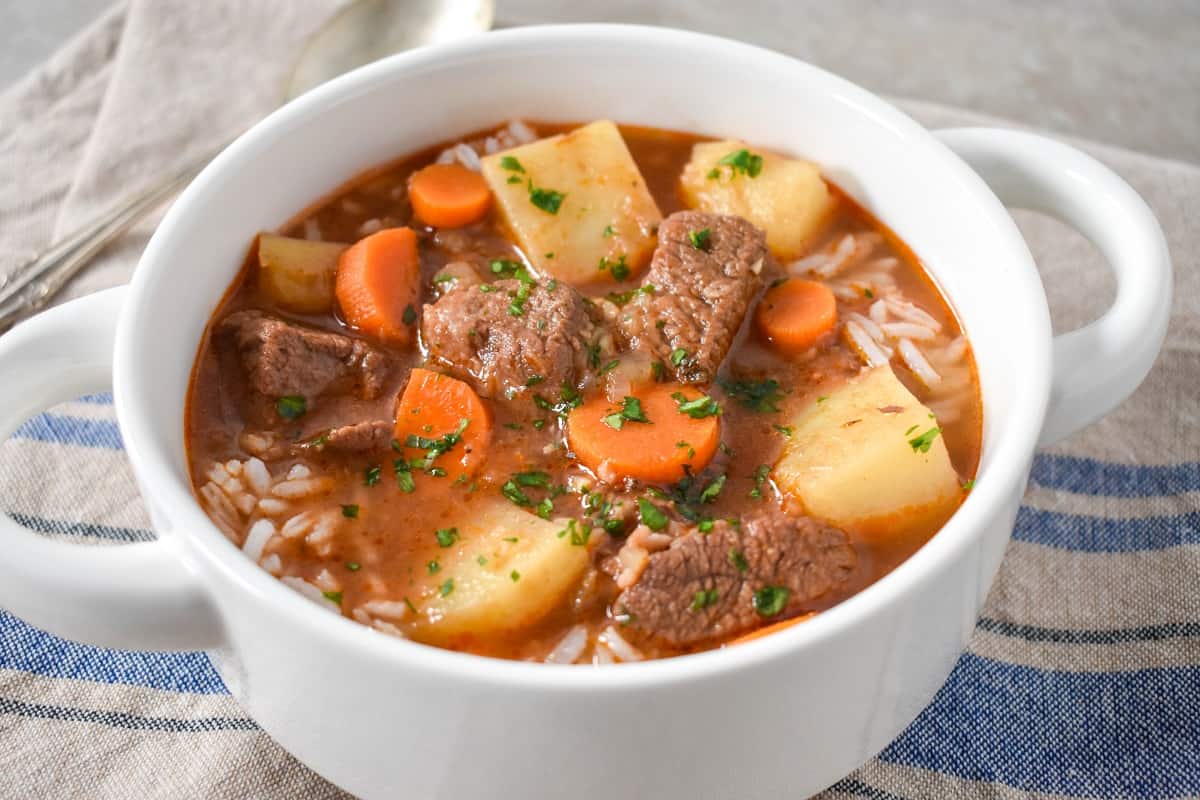 A close-up image of the soup served in a white bowl.