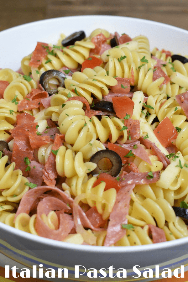 This Italian pasta salad is easy to make and delicious. It comes together quickly and the only cooking involved is making the pasta. Make it extra special with a homemade Italian dressing that’s just as easy to make. This is a great dish for picnics and summertime parties. #Italianpastasalad #pastasalad #summersides #summertime