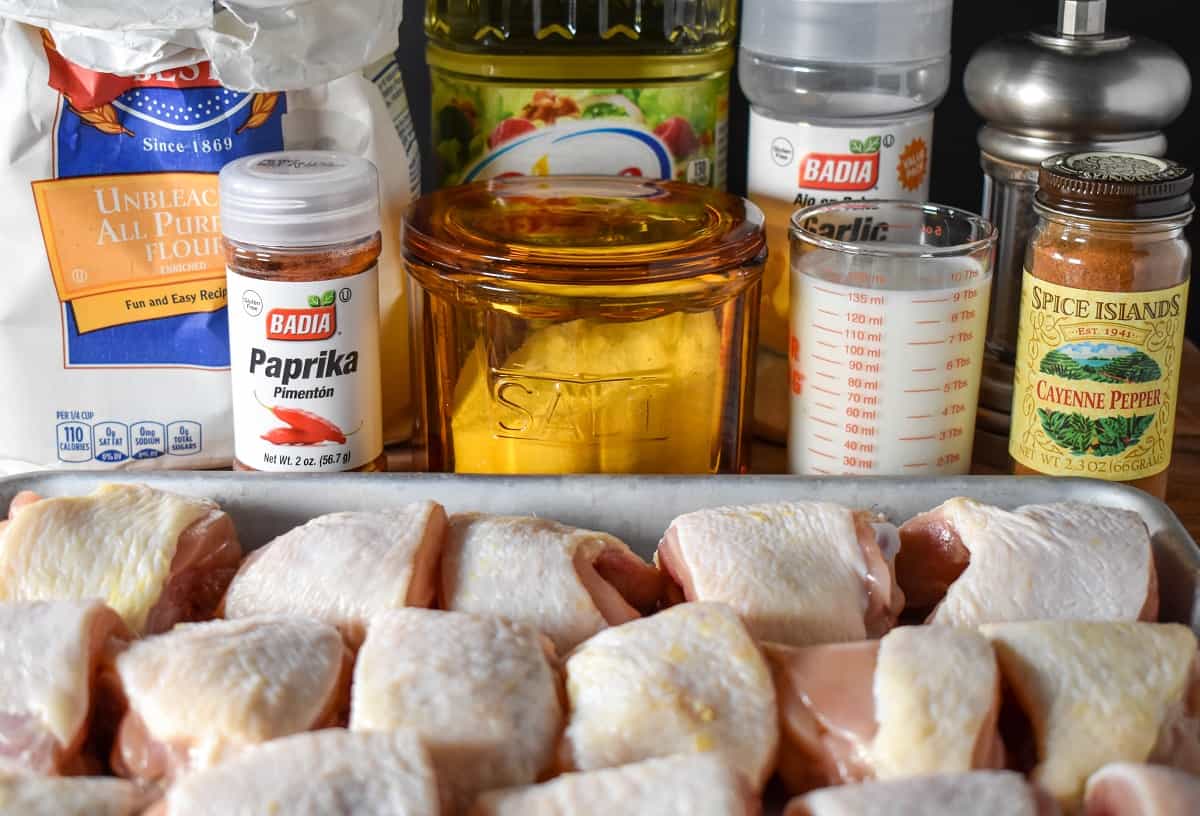 A picture of all the ingredients for this dish displayed on a wood cutting board.