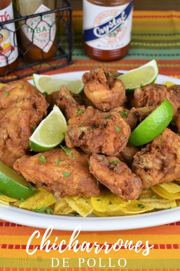 Chicharrones de Pollo is the Cuban food version of fried chicken. Chicken pieces are cut in half and seasoned. Then they’re coated in flour and fried until golden and crispy. Serve the chicharrones de pollo with white rice and black beans for a traditional take, or serve them appetizer style with lime wedges and hot sauce. #chicharronesdepollo #cubanfriedchicken