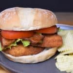 Crispy Chicken BLT, a breaded and fried chicken cutlet topped with bacon, lettuce and tomatoes served on a sandwich bun