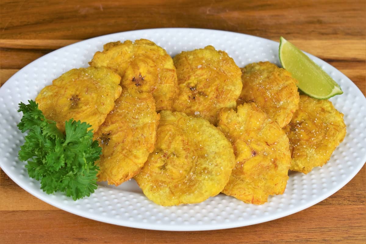 Tostones (Fried Green Plantains) .