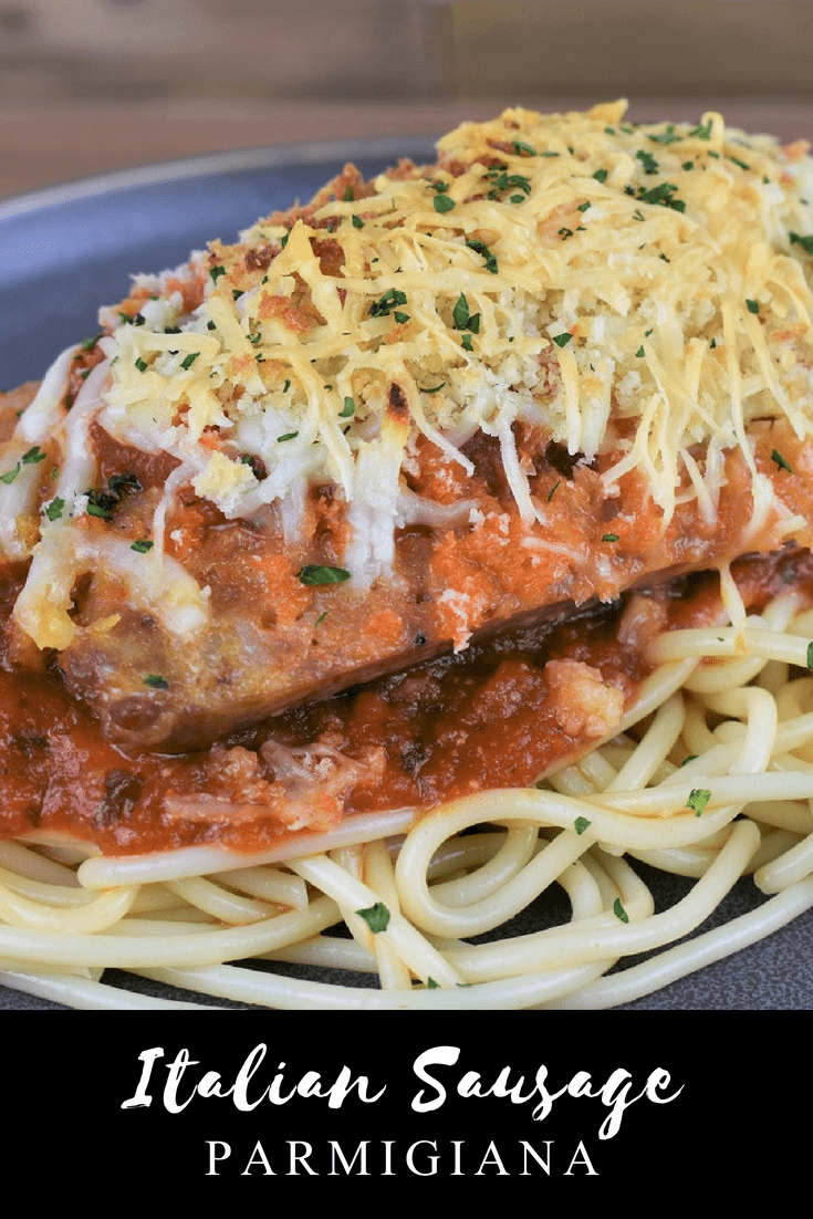 Italian Sausage Parmigiana, for this dish, flavorful Italian sausage is topped with pasta sauce, mozzarella and Parmesan cheeses and crunchy breadcrumbs. Then it's served on top of a bed of pasta, for a fun take on traditional Parmigiana. #Italiansausageparmigiana #Italiansausage #sausage #easydinners #pasta #parmigiana