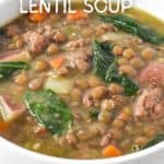 A close up of the Italian sausage lentil soup served in a white bowl with a white graphic overlay with the title in white letters.