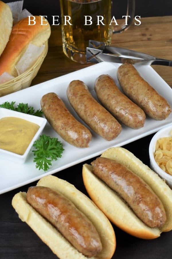 These beer brats are easy to make and delicious. Fresh bratwurst are browned and simmered in beer. The sausages are served on buns and topped with sliced onions that were cooked in the same skillet; so they’re golden and super flavorful. This beer brats recipe is perfect for your next game-day or Oktoberfest party. #beerbrats #bratwurst #oktoberfest #oktoberfestrecipes #cook2eatwell