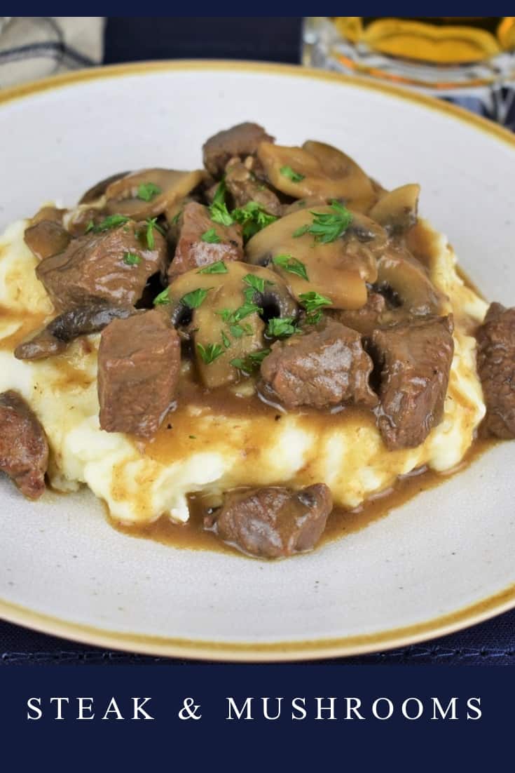 This steak and mushrooms dinner comes together quickly, and it's absolutely delicious. In this recipe, sirloin steak in cut into bite sized pieces and cooked in a flavorful mushroom sauce. We serve the steak and mushroom over a bed of mashed potatoes for a filling, comforting meal that is sure to please. #steakandmushrooms #steakandmushroomgravy