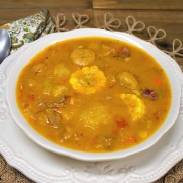 Ajiaco soup served in a large white bowl