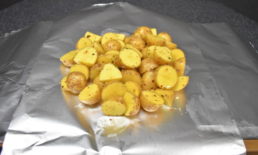 Honey Gold potatoes on aluminum foil.