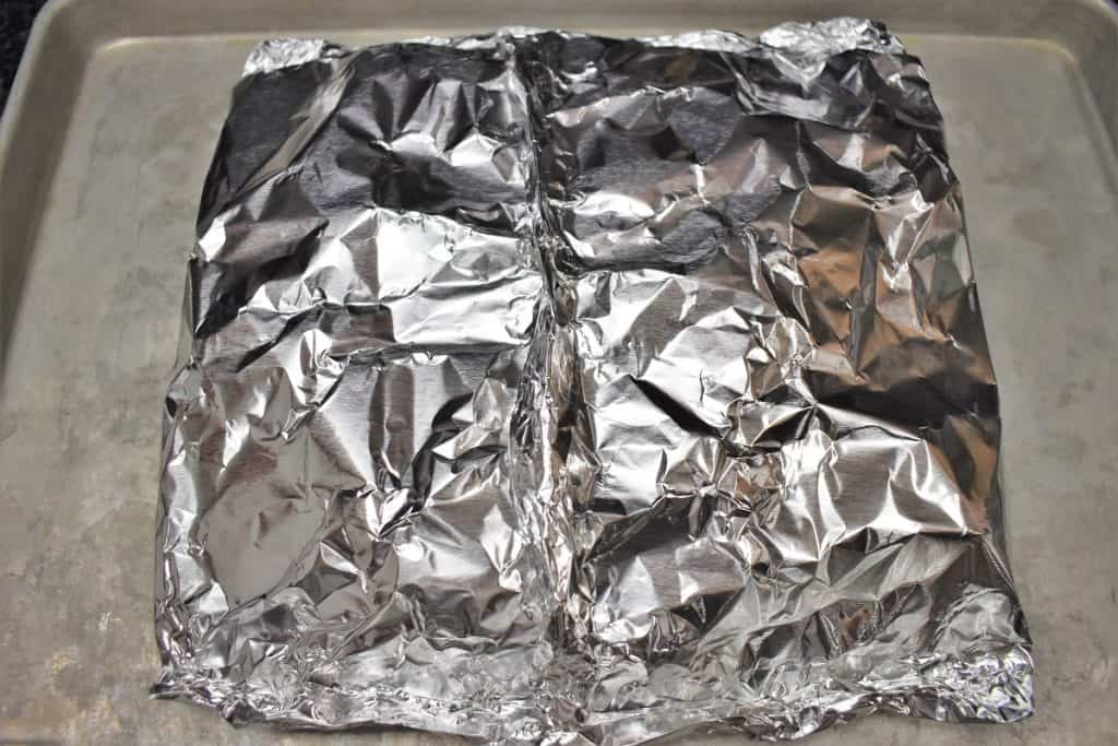 A completed foil packet displayed on a metal sheet pan.
