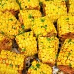 Seasoned corncobs cut into pieces and garnished with chopped parsley.