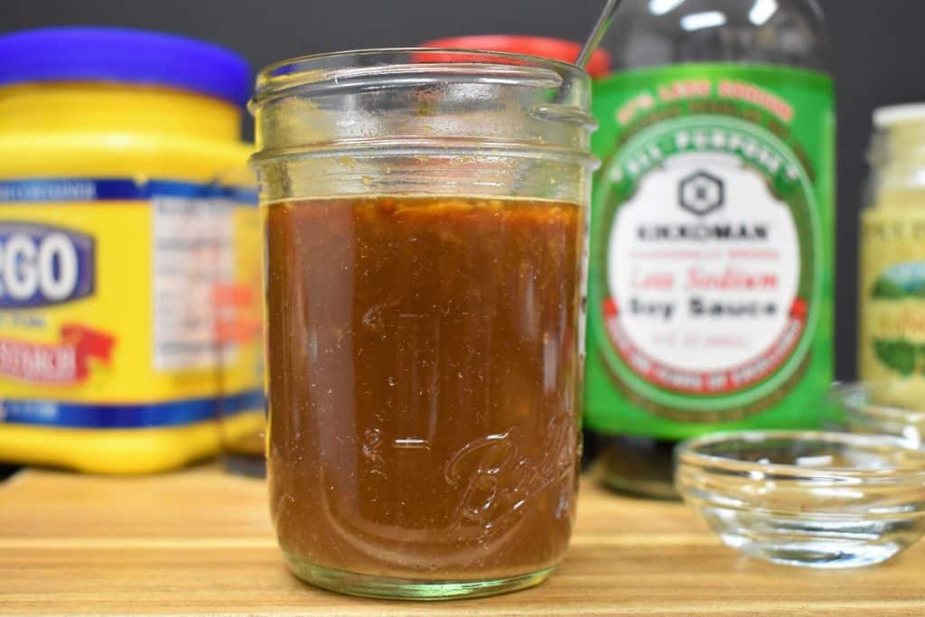 Stir fry sauce in a small jar.