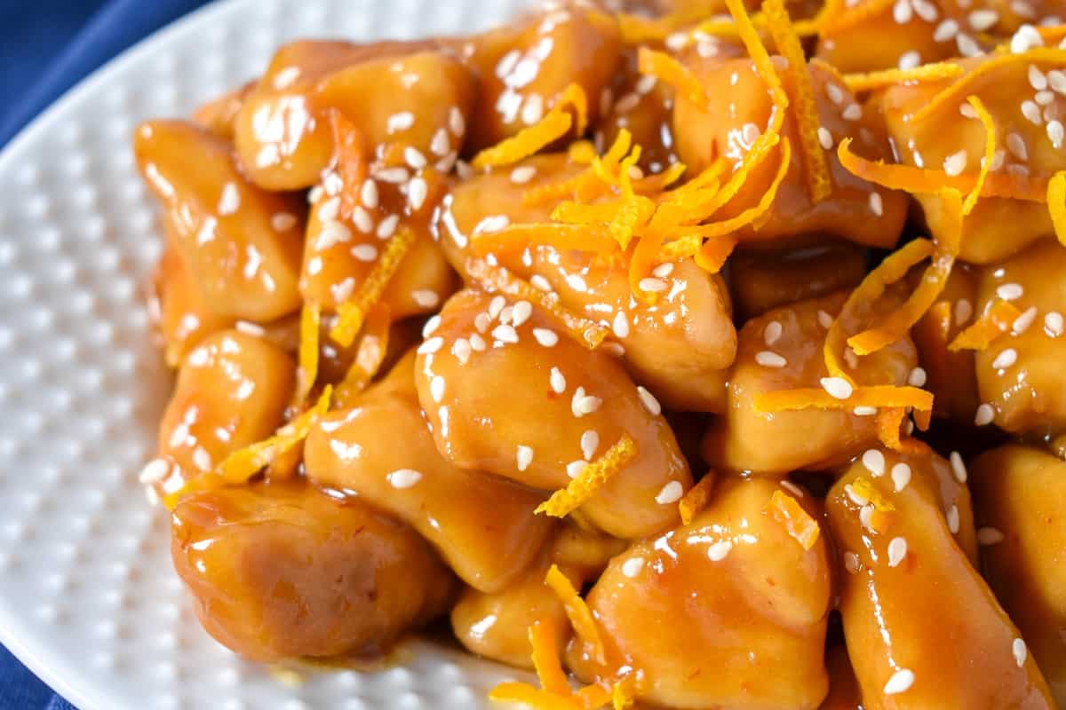 A close up image of the chicken served on a white platter.