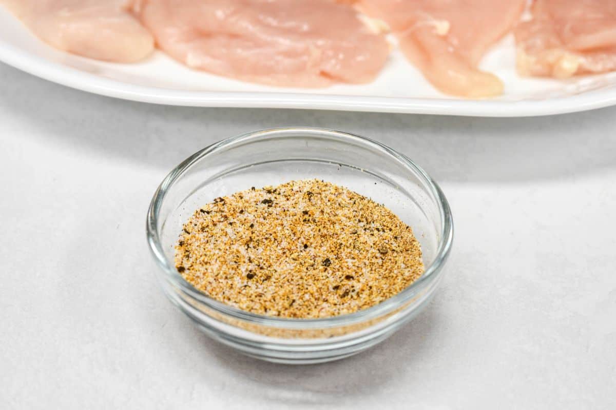Seasoning mix for chicken and mushrooms in a small glass bowl.