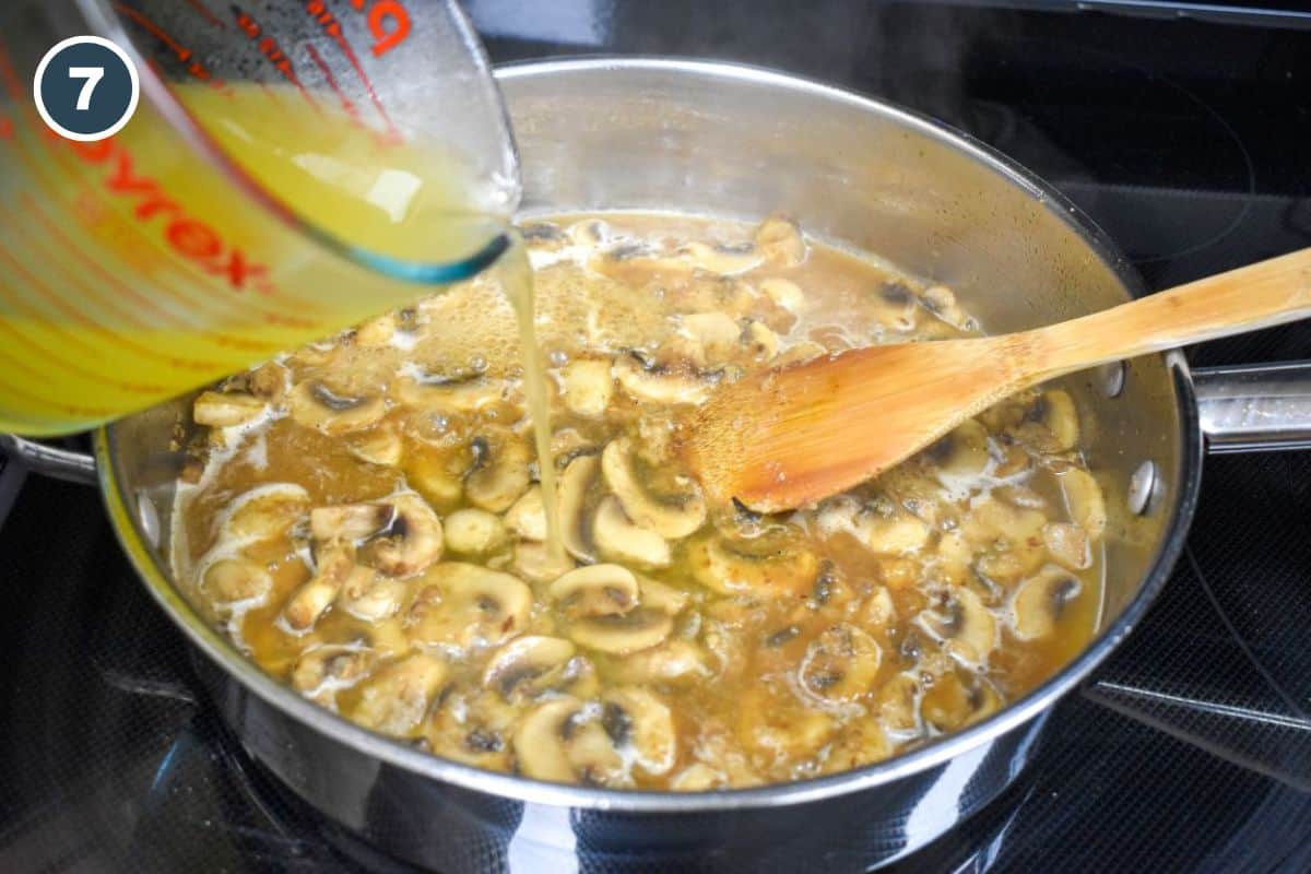 Pouring chicken broth into the mushroom mixture.