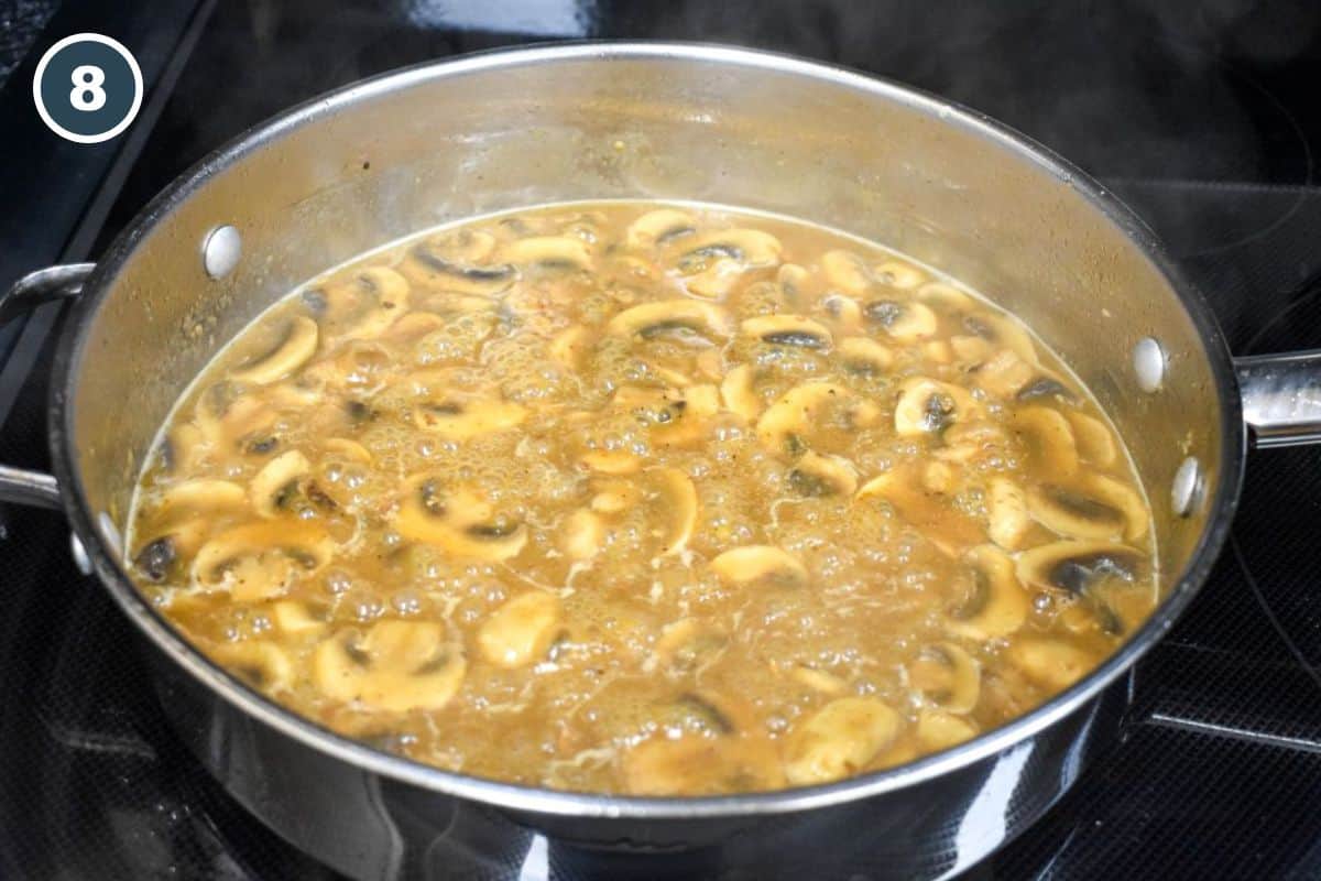 Homemade mushroom gravy simmering in the skillet.