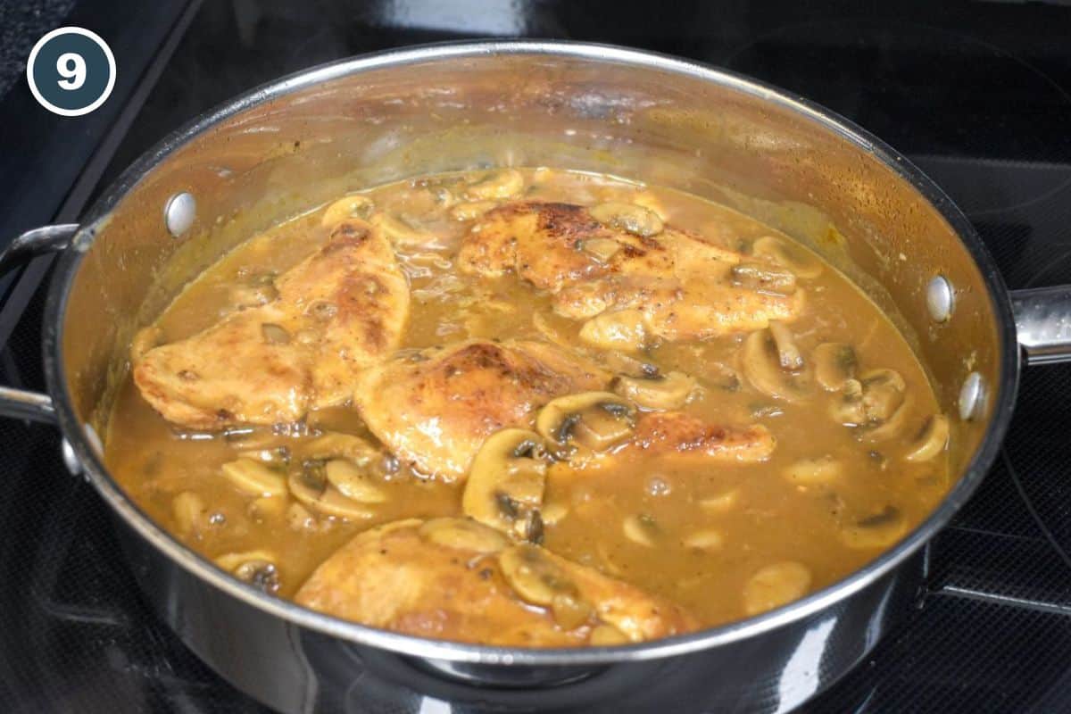 Chicken cutlets returned to the pan and coated in mushroom gravy.