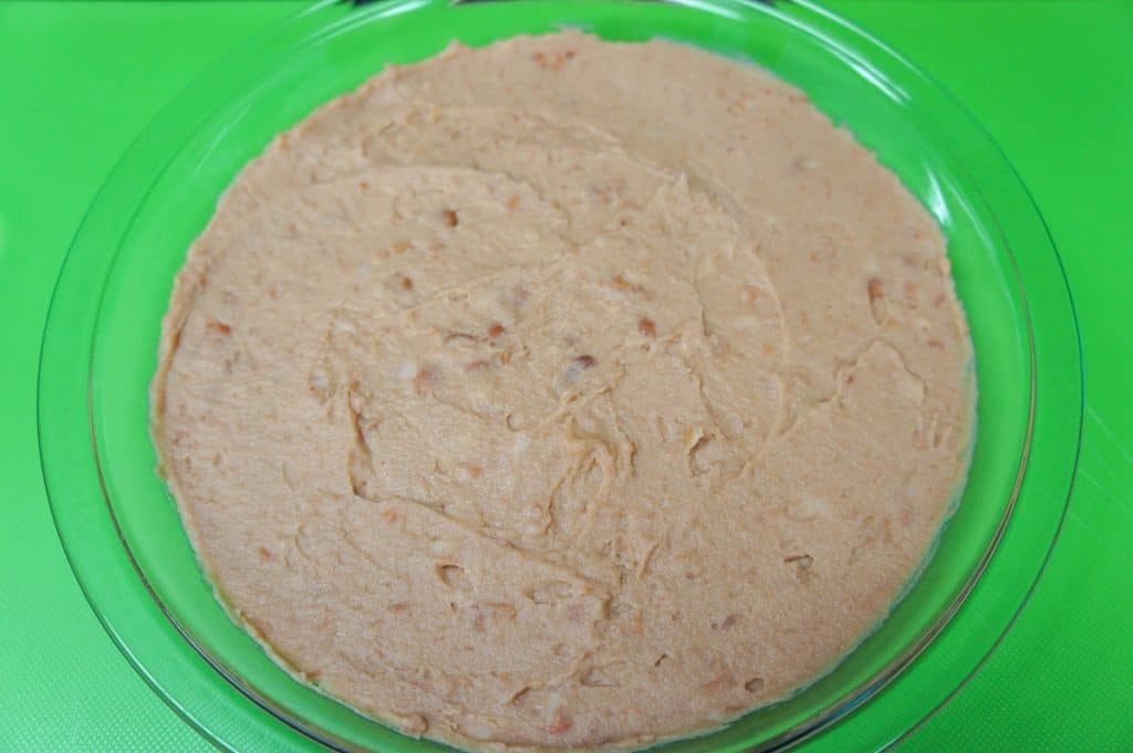 Refried Beans in a glass pie plate.