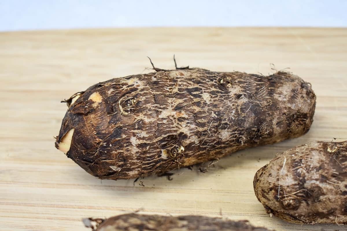 Malanga on a wood cutting board.