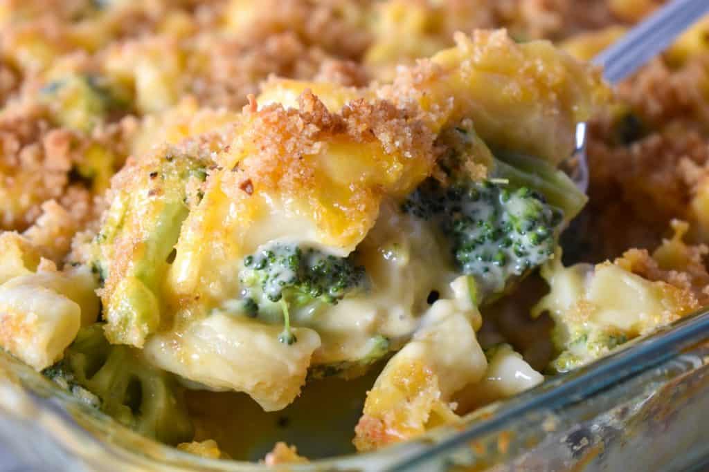 A large spoon serving the chicken and broccoli casserole.