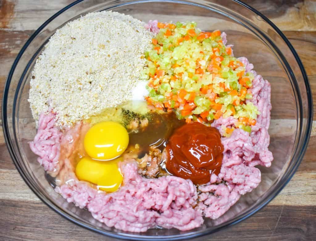 The ingredients in a large, glass bowl before being mixed.