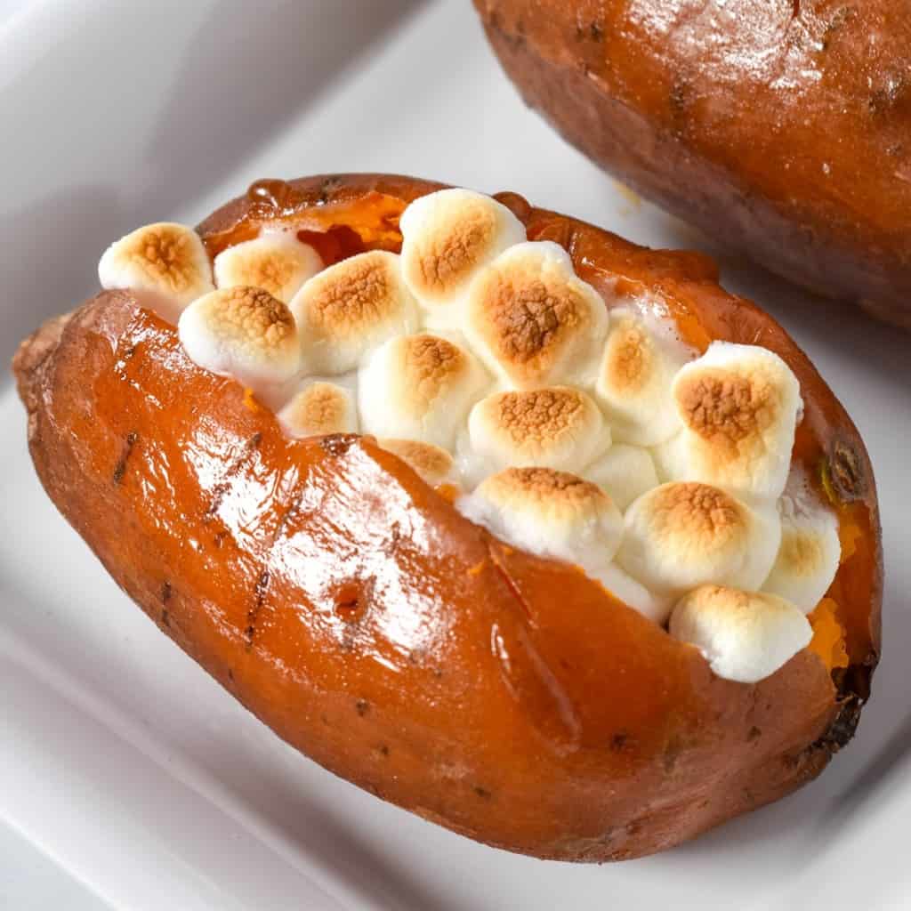 An image of the loaded sweet potatoes arranged on a white platter.