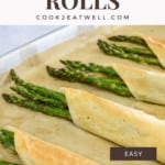 The finished asparagus rolls on a baking sheet lined with parchment paper. Above the image is the title in large, dark letters on a white background.