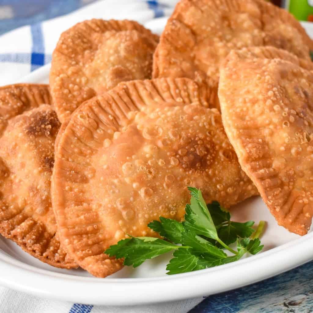 An image of the empanadas on a white platter.