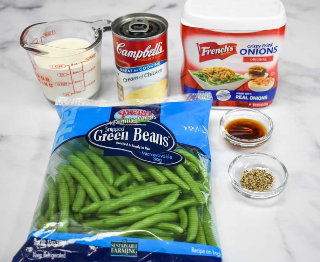 The ingredients for the casserole arranged on a white table.