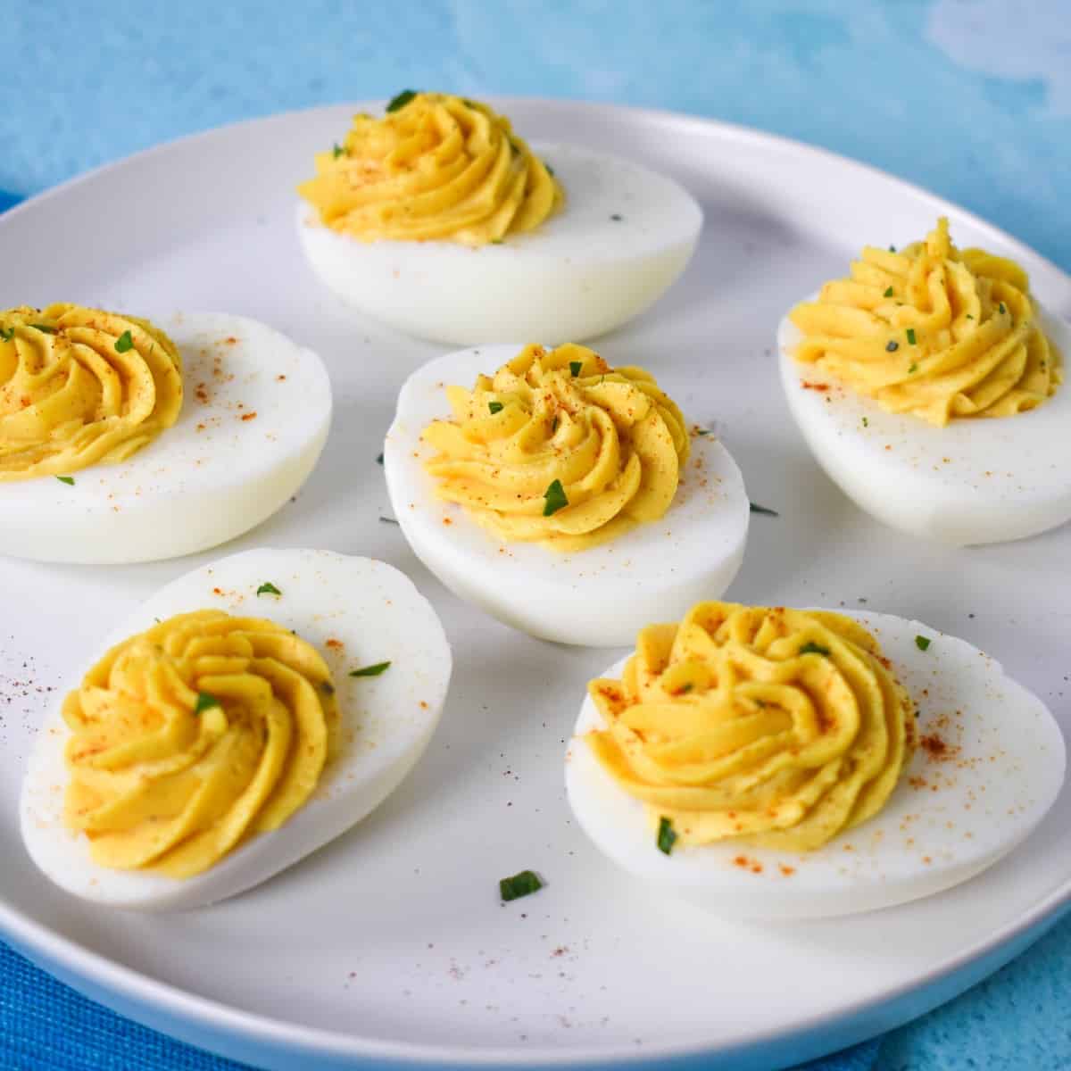 https://www.cook2eatwell.com/wp-content/uploads/2021/12/deviled-eggs-image-1.jpg
