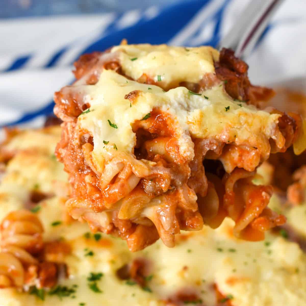 A close up image of a serving of the lasagna casserole.