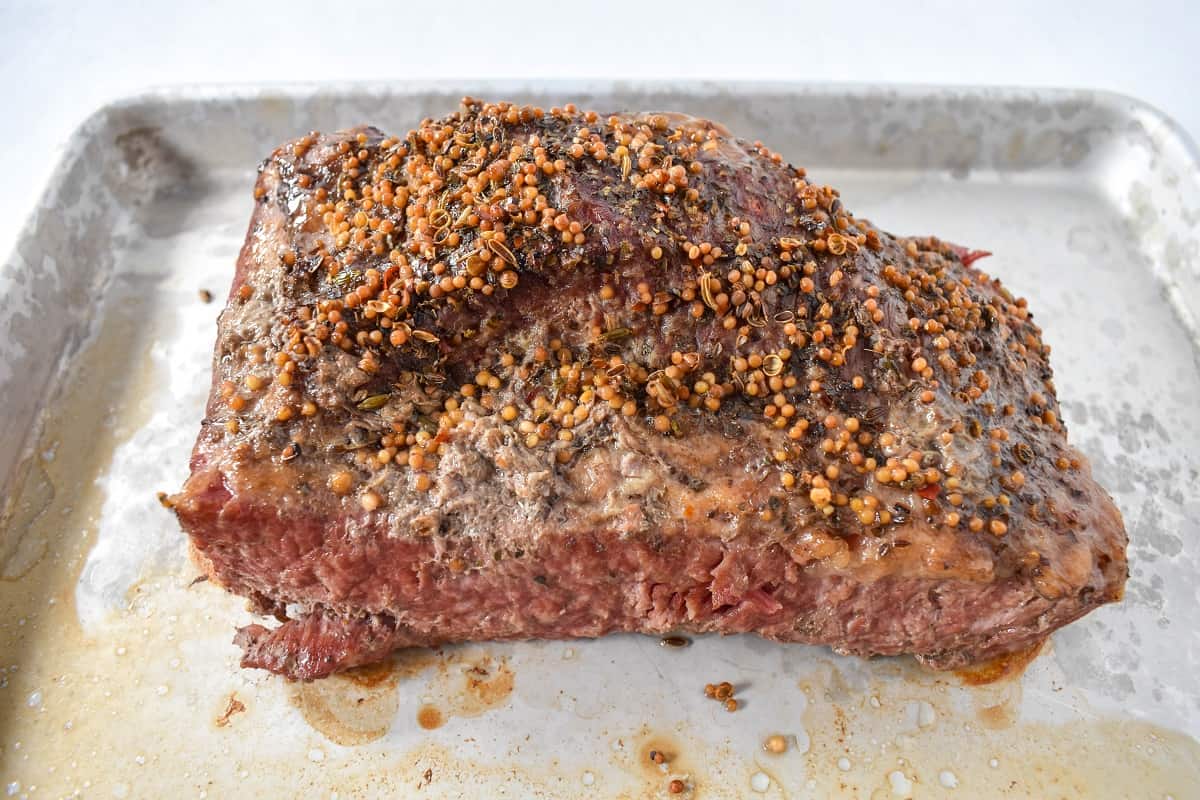 The beef on a sheet pan after broiling the top.