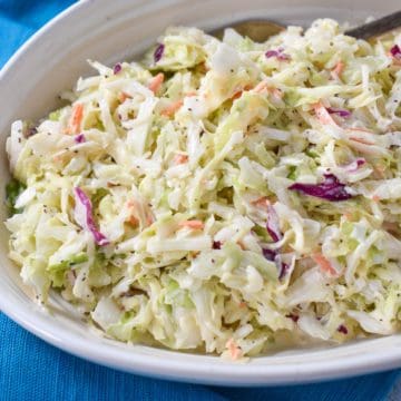 An image of the coleslaw served in a white bowl.
