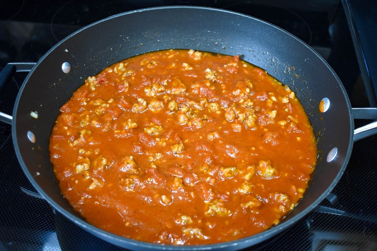 An image of the finished Italian sausage sauce in the skillet.