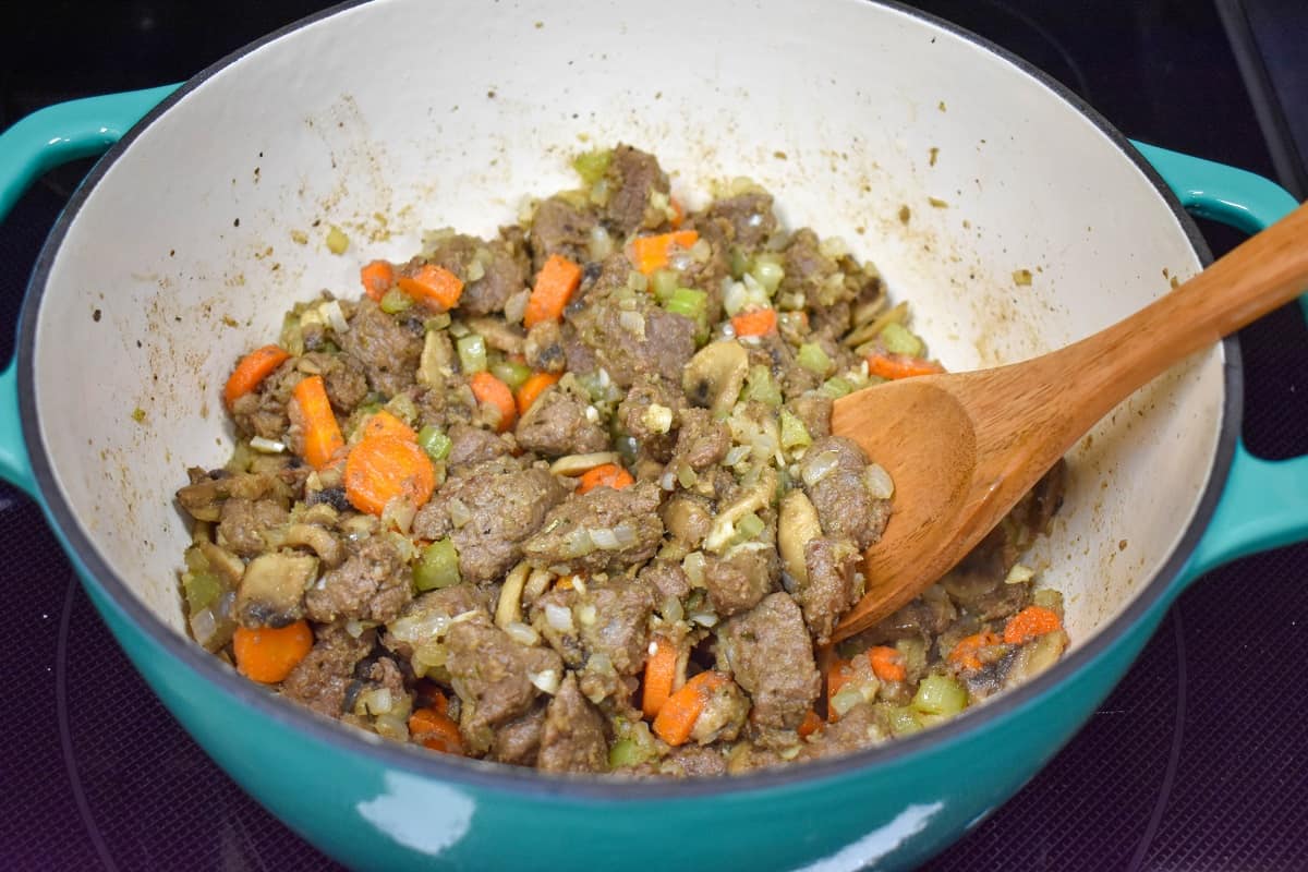 The stew ingredients in the pot before adding the broth.