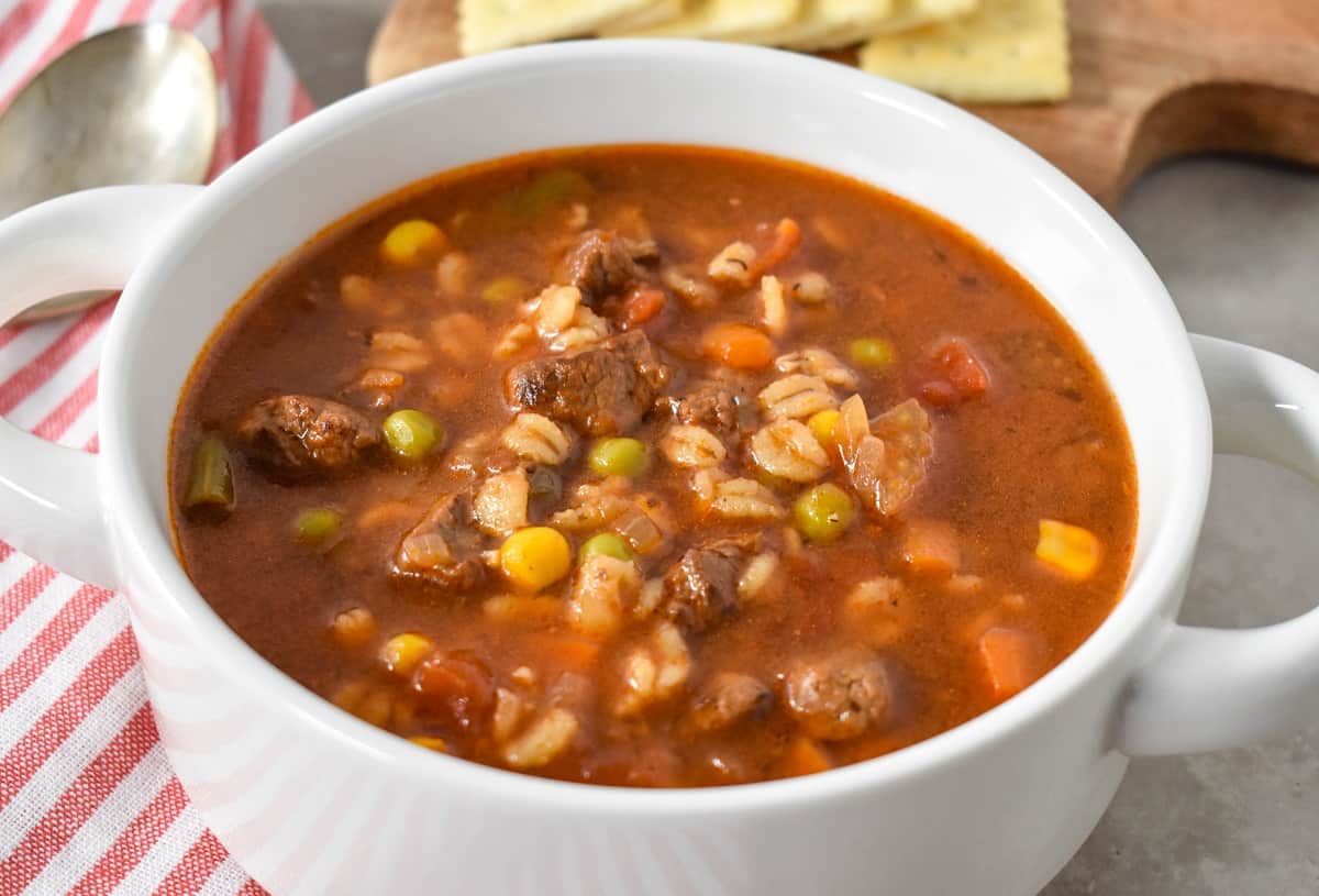 A close up of the soup served in a white bowl.