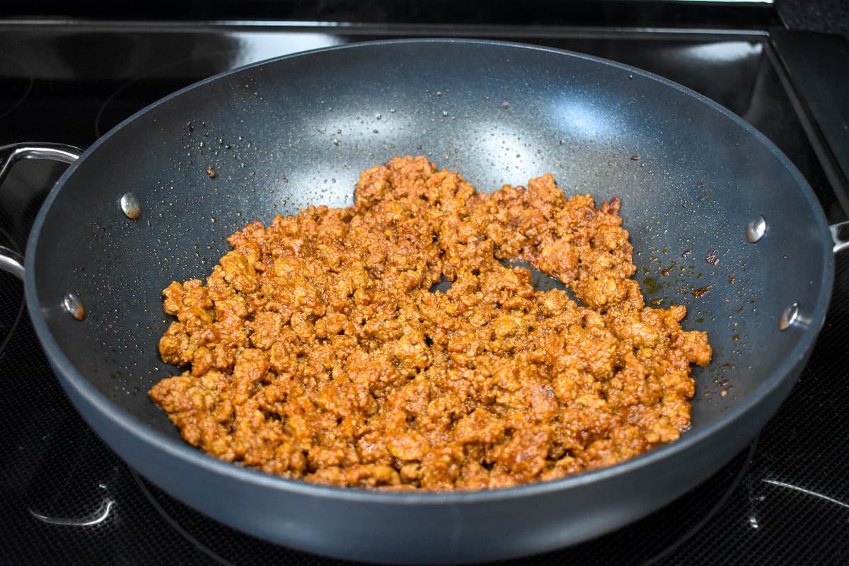 The finished taco meat still in the large, black skillet.
