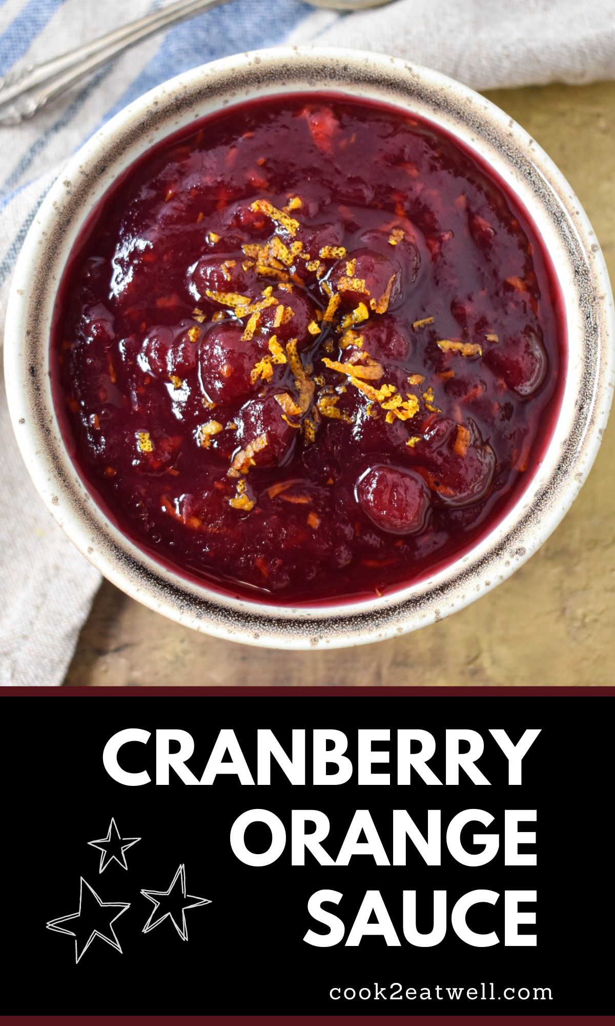 The finished cranberry sauce served in a small bowl with a black graphic underneath with the title in white letters.
