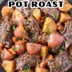 The french onion pot roast served on a large gray platter.