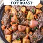 Pinterest pin featuring French onion pot roast with tender beef, red potatoes, and carrots in a rich onion sauce, garnished with parsley. Text overlay reads 'French Onion Pot Roast' with cook2eatwell.com at the bottom.